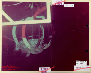 Submersible manipulator holds sunken film capsule