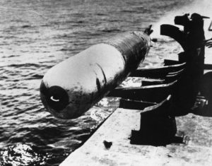 A Mark 13 torpedo being launched off rails on a PT boat