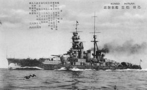 Photo of Japanese battleship Kongo at sea with Japanese characters at top of image
