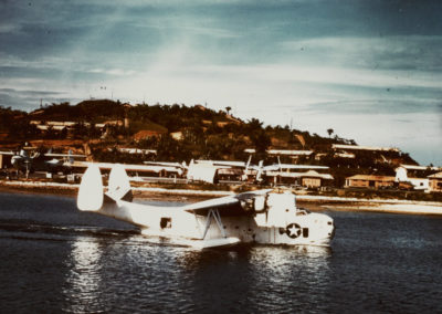 White bomber aircraft resting in the water