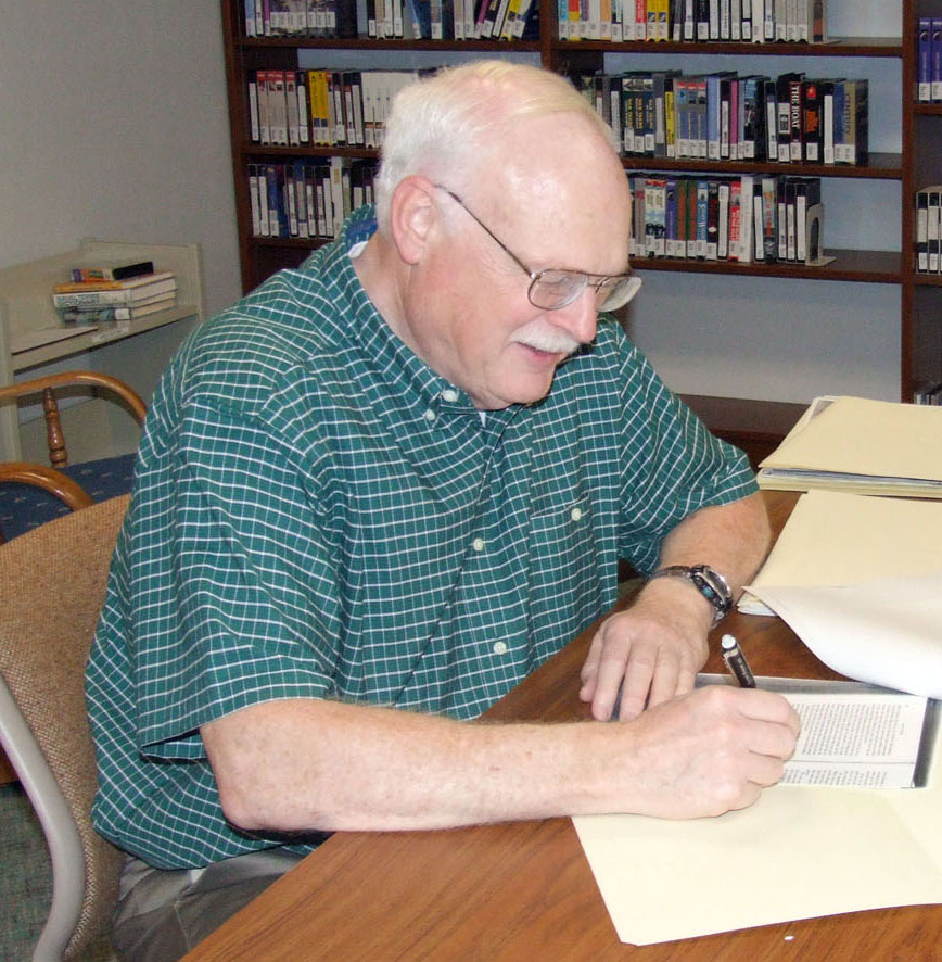 Charles diligently processed an archival collection at the Naval Undersea Museum.